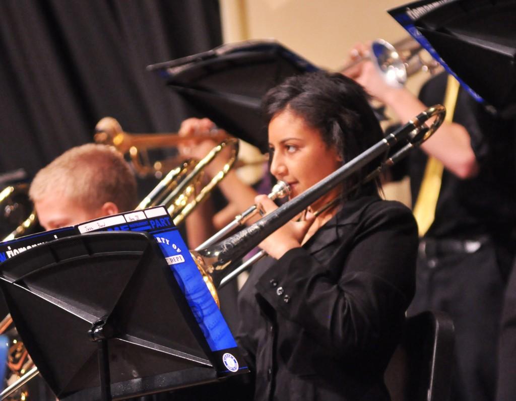 Jackie Anderson performs with the Jazz Band. Anderson plays the bass trombone, a lower version of the standard trombone.