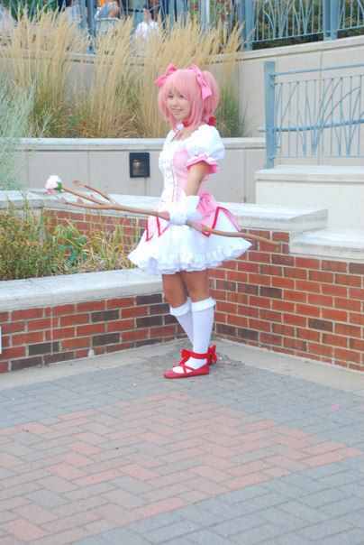 Junior, Anna Lam, poses in a photoshoot at Anima Iowa in Iowa City. Lam cosplayed Madoka Kaname (pictured here) from the anime, Puella Magi Madoka Magica. She also cosplayed characters from Avatar: The Last Airbender and Gurren Lagann. 