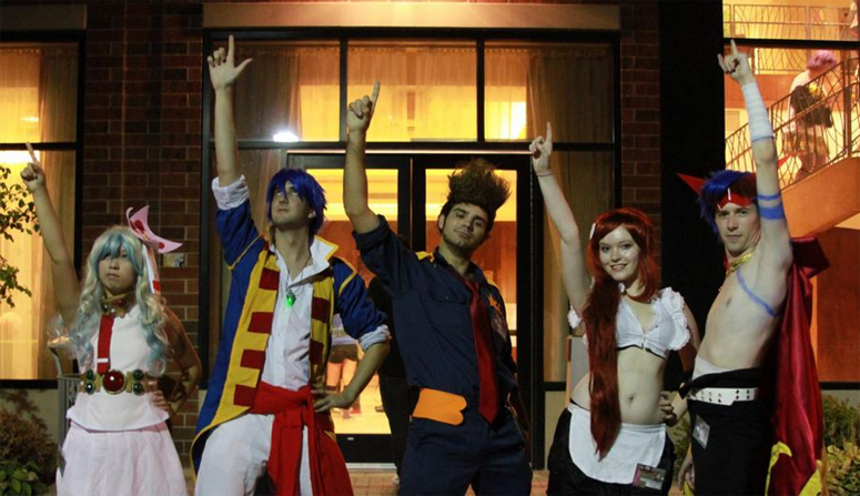 (From left to right) Anna Lam, Jesse Collins, Shawn Kendrick, Sofi Shannon, and Joeseph Swallow cosplay as a group of characters from Tengen Toppa Gurren Lagann at Anime Iowa in Iowa City. Anime Iowa took place at the Iowa City Marriott on July 27-29. 