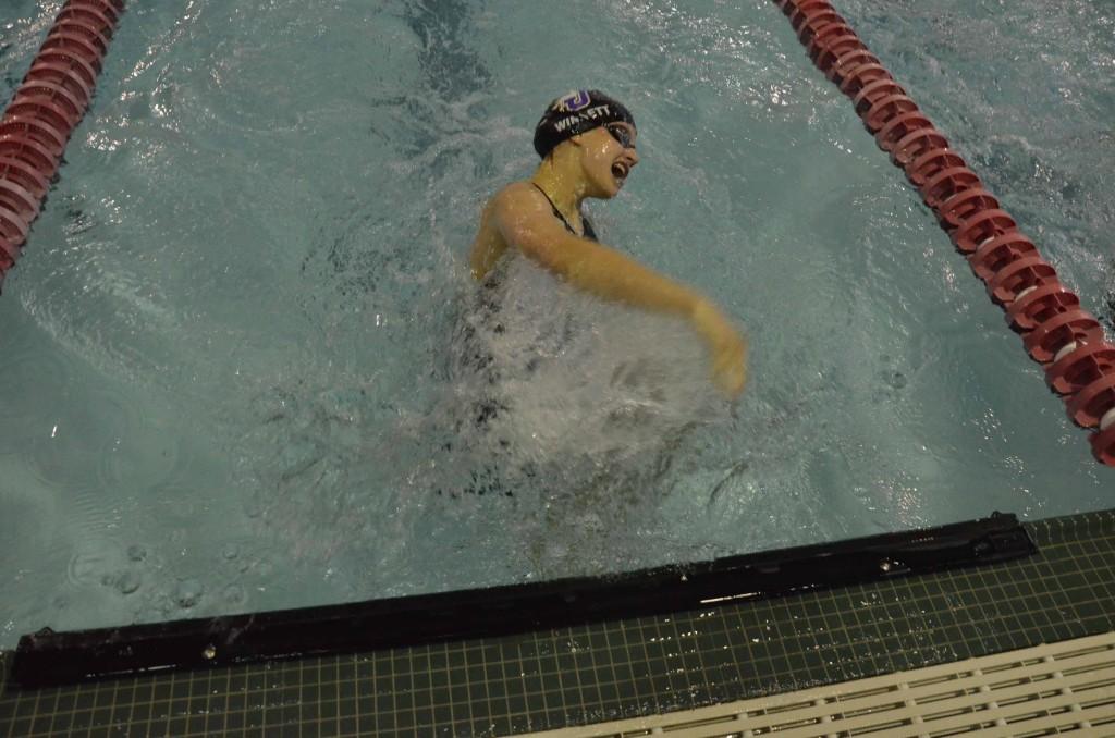 Freshman Lexi Winnett does a turn during the 100 breaststroke at the state swim meet. Winnett finished 11th with a time of 1:08.82.