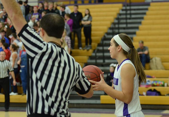 Number 20, sophomore Haylee Towers receives the ball from a referee to pass to a teammate. 