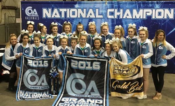 The Iowa Elite Cheer team posses for a picture after winning the titles of first place in small senior level three, national champions, grand champions, at a competition in Kansas City last season.