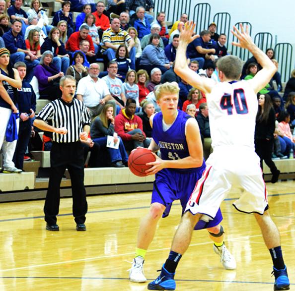 Boys varsity plays at Urbandale at a prior date in the uniforms that Hoover was forced to wear. 