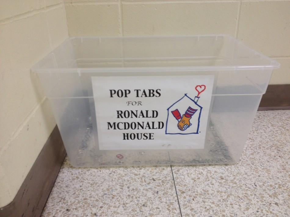 The+pop+tab+bin+that+sits+outside+the+lunchroom+doors+next+to+the+glass+case.+Money+for+the+recycled+tabs+is+used+to+help+fund+the+Ronald+McDonald+house+and+those+staying+within+it.