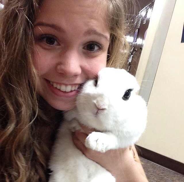 Becca Swanson takes a selfie with Howie while in her animal science class. 