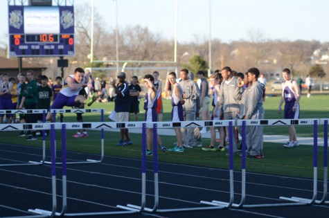 Senior Jack Bergstrom runs the hurdles during the track invitational March 31 at the home football stadium.