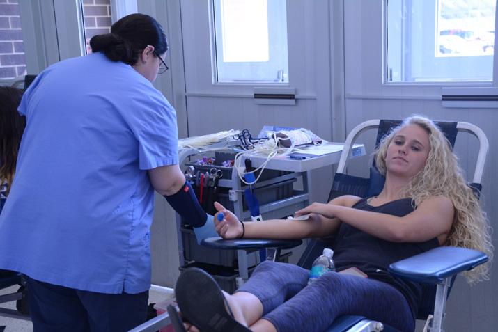 Senior Payton Thompson participates in the blood drive May 2015. LifeServe gives students the opportunity to donate each semester.