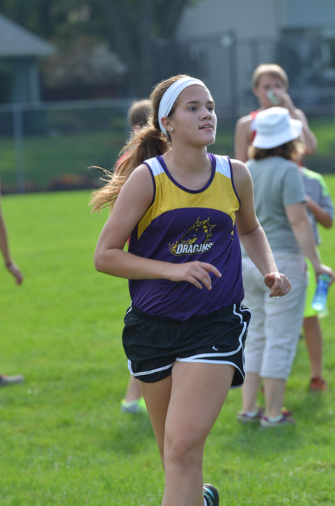 Junior+Jessica+Bigelow+runs+at+the+cross+country+meet+held+this+past+Saturday%2C+Sept.+5.+at+Urbandale+High+School.+Running+is+a+sport+that+at+times+is+a+challenge%2C+but+I+love+it%2C+Bieglow+said.+