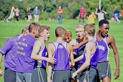 The varsity runners get pumped minutes before they start their race. Sept. 19 the boys' varsity runners placed sixth overall, and JV ninth out of 26 teams from the heartland area.