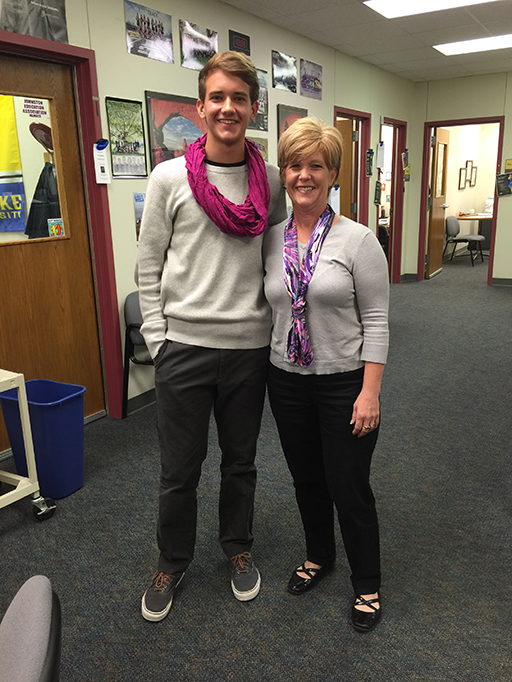 Sporting a scarf is senior Bernardo Duarte who dresses like guidance secretary Sarah Marckmann.