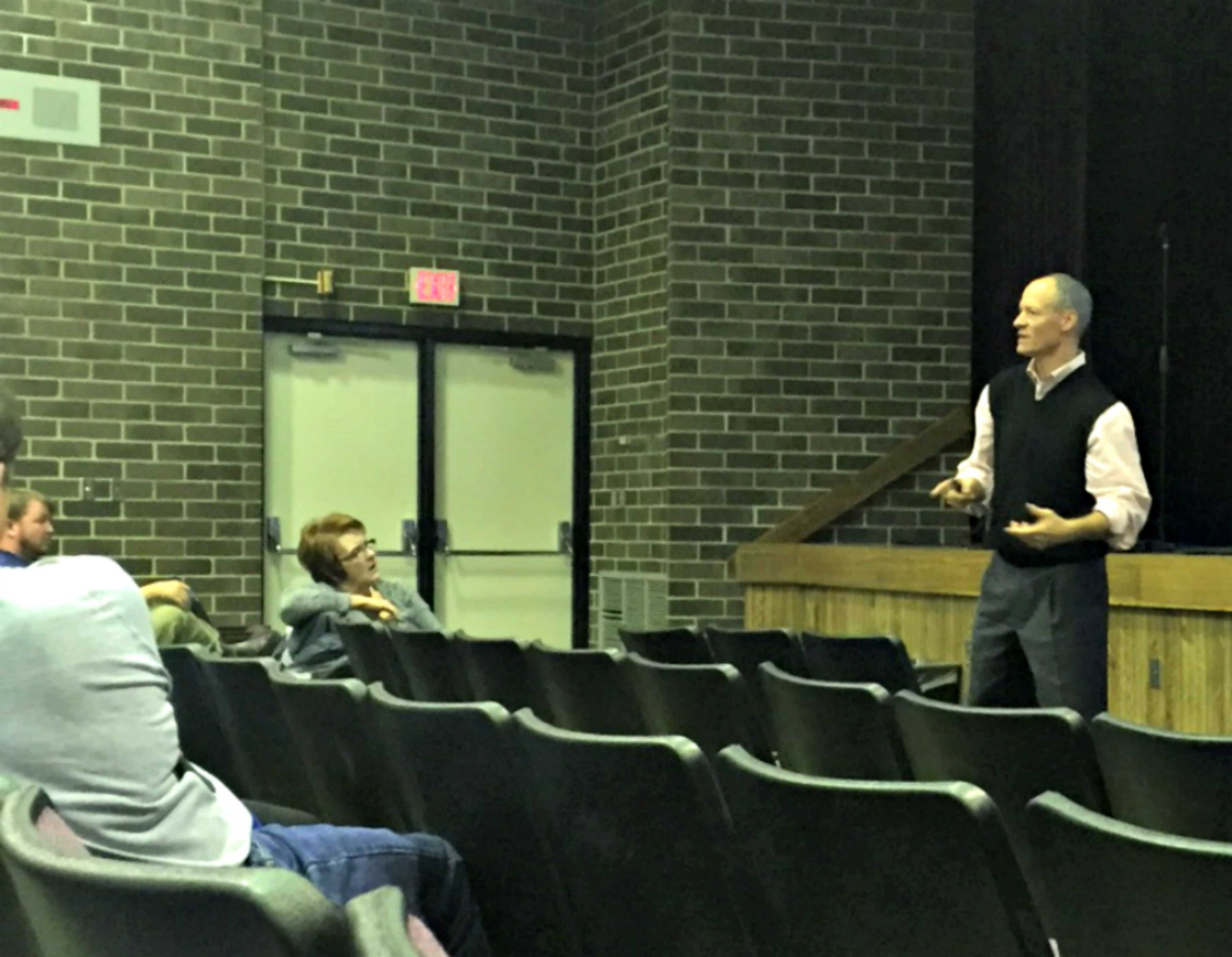 Dr. Jeff Kerber addresses an audience of parents. A community forum about signs of suicide and depression was held on Nov. 18.