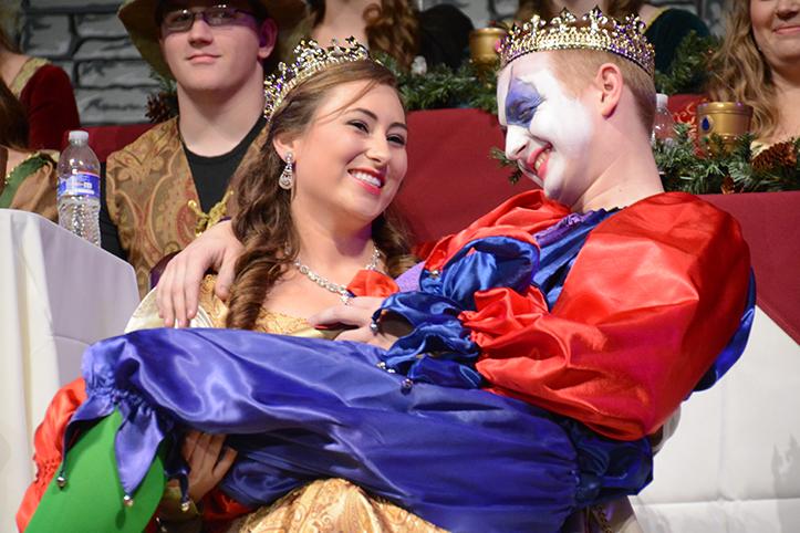 The queen, senior Tiani Swallow, allows the new king, senior Adam Dostalik, to sit on her lap after the king and jester switch places. Swallow and Dostalik had to perform the scene again after the cast realized they had forgot a few of the lines prior. It was really weird at first, I read the script and I was like oh we arent going to do that, I dont have to worry about it, Swallow said. She [Thompson] was just like okay now youre going to go sit on her lap and I was like wait what, were actually doing that?