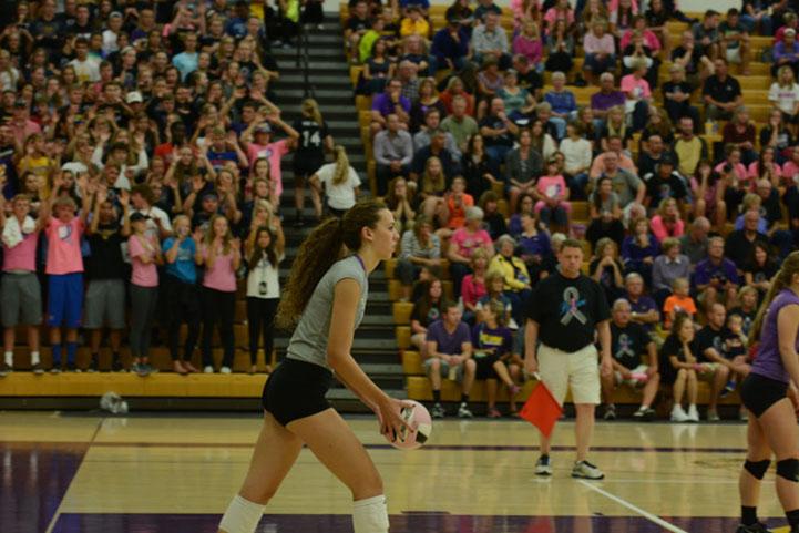 Junior Taryn Knuth prepares to serve at the Dig Pink Spike Blue volleyball match on September 29. Knuth, who was named 1st team all conference and 1st team all division this school year, signed to play Division I volleyball at Florida State University. 