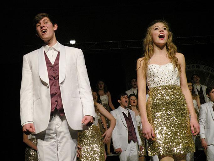 Sophomores Andrew Janni and Kylie Watson perform at the 20 year anniversary of Showzam. More than 30 show choirs were invited to participate in this event.