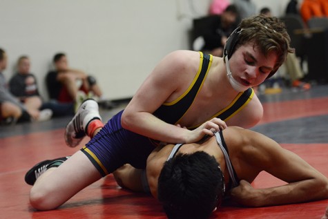 Having a strong grip on his Valley opponent Sophomore Elliott Pohlmeyer takes a strong lead. Johnston participated in the Urbandale Invitational Jan. 23 and placed third with a score of 140.