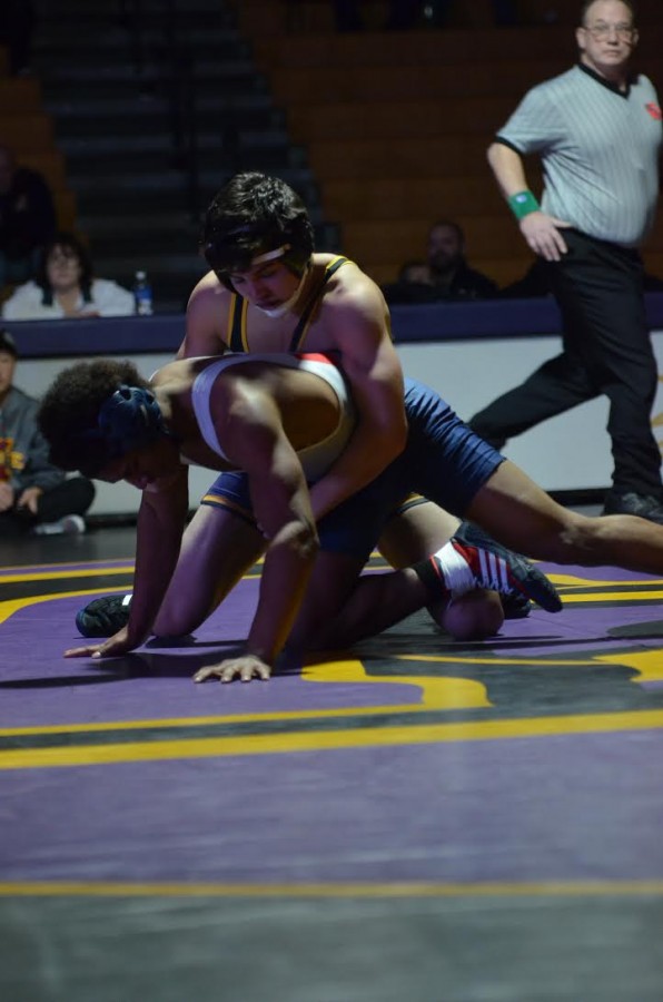 Pinning+an+Urbandale+opponent+senior+Ethan+Ksiazek+who+goes+on+to+win+the+match.+Ksiazek+and+other+varsity+members+competed+Jan.+14+at+home+against+the+J-Hawks.