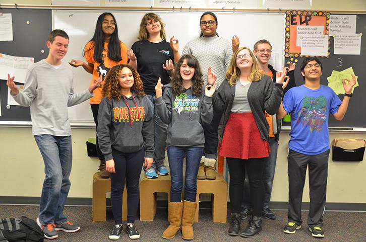 During their victory get together, Academic Decathlon State qualifiers pose for a group shot. Members are currently working towards State March 4 and 5 held in Spirit Lake. 