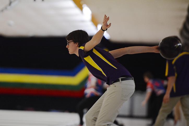 Senior Loyal Ulm winds up to release the bowling ball. The team competed at their Jan. 28. at Val Lanes. 