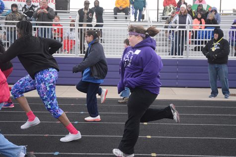 Sprinting in her event senior Miranda Kerr participates in the 50 meter dash. The Special Olympics were held April 5 at Indianola High School.