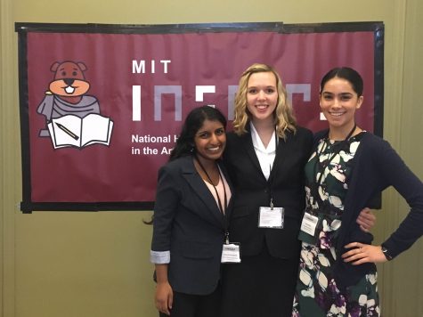 Rivett smiles with friends she met at the MIT conference.