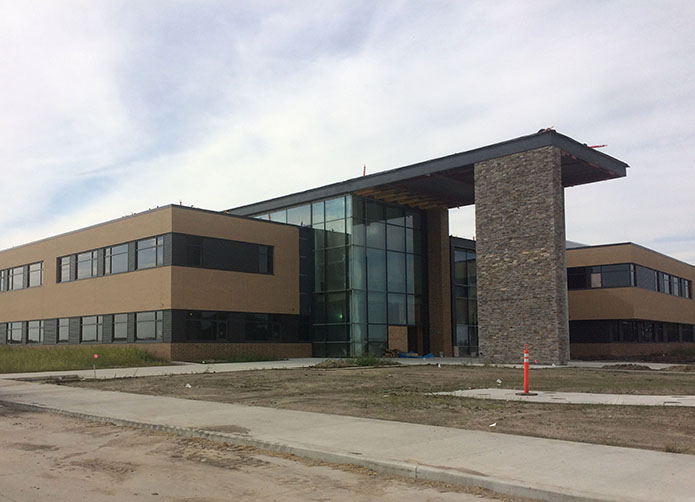 The main public doors that will open into the attendance and administrative offices. The building is set to be completed in April 2017.
