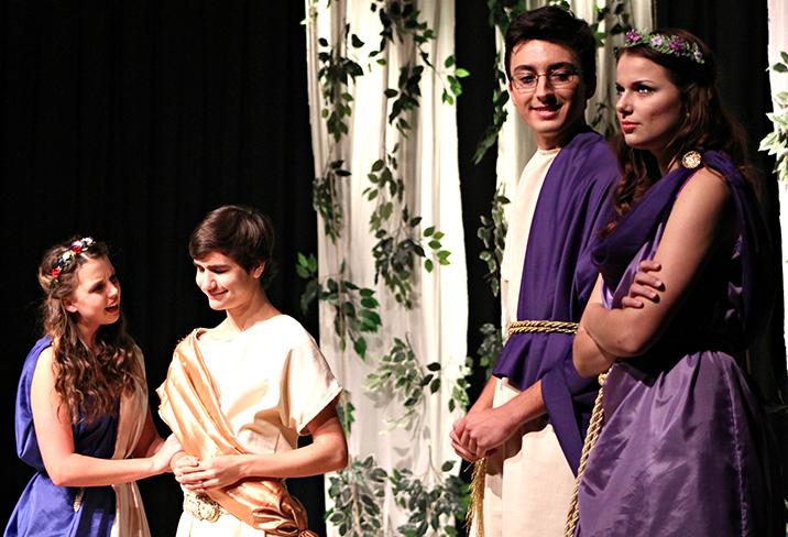 Helena (Lizzie Boeschen 17) and Demetrius (Ben Smaltic 17) listen to what Lysander (Will Linder 17) is trying to explain to Hermia (Nicole Hbson 17). 28 students performed in the play A Midsummer Nights Dream, while four students assisted backstage as crew members.