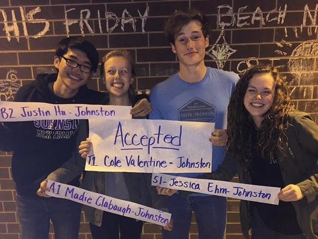 Justin Hu 17, Madie Clabaugh 17, Cole Valentine 17 and Jessica Ehm 17 celebrate after seeing the results of the All State auditions. Auditions were held Oct. 22 in Indianola.