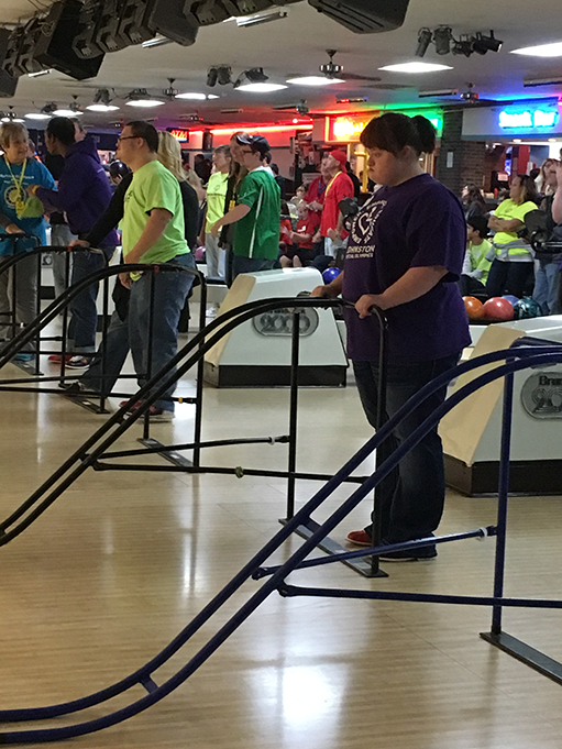 Student Miranda Kerr watches her ball after rolling it down the ramp. Kerr and Mason Merak qualified for the state competition Nov. 19.