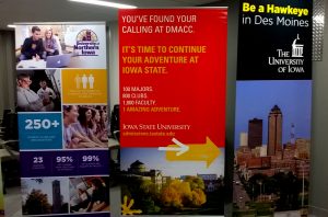 Posters hang at DMACC for college transfer students. Transfer students make up about 40 percent of student populations in the three state universities.