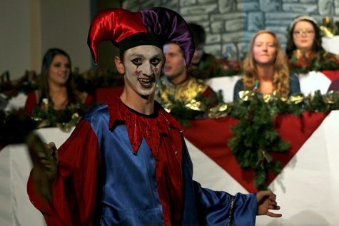 The Jester (Michael Gedden 17) points out to the audience after telling one of his many jokes. Madrigal was held Nov. 30 and Dec. 1.