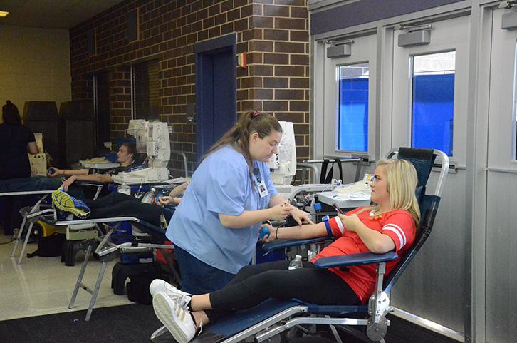 Lauren Bellies '17 prepares to have blood drawn. Around 120 students volunteered to have blood drawn April 12.