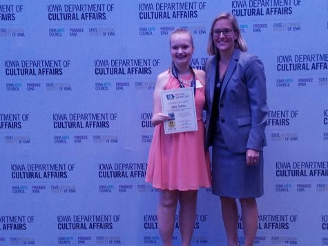 Allie Tubbs '19 accepts her award at the National History Day competition. She performed well and advanced to State with her performance.
