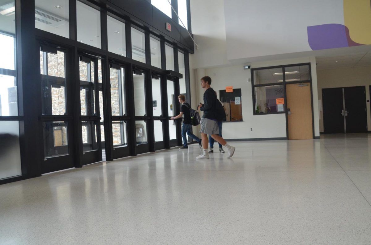 Micah Kragt, 18, leaves the building for lunch. As of this year, both juniors and seniors have open campus.