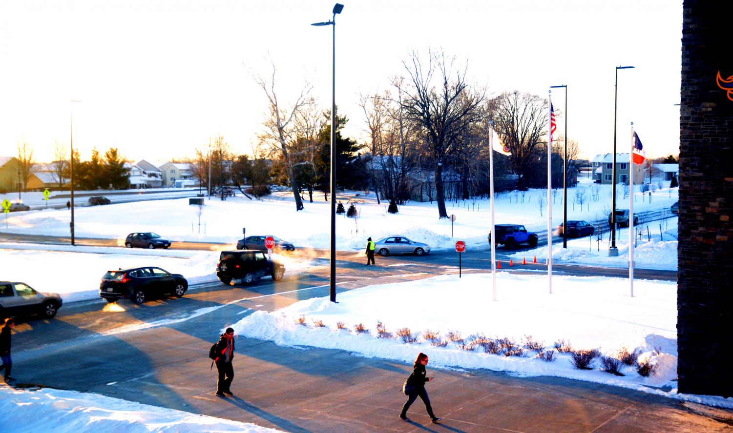 Johnston High School students arrive at the school around 7:30 a.m.. If the start times were to be changed, high school students would begin their first period at 8:30 a.m..