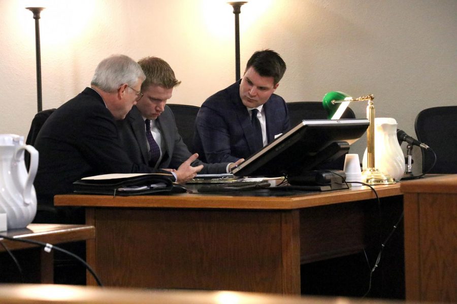 Former teacher Dustin Mead (center) listens in on advice from his attorneys, Guy Cook (left) and Adam Zenor (right). Meads sentencing was held April 9 at 8:15 a.m.
