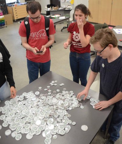 Students make buttons to combat hate