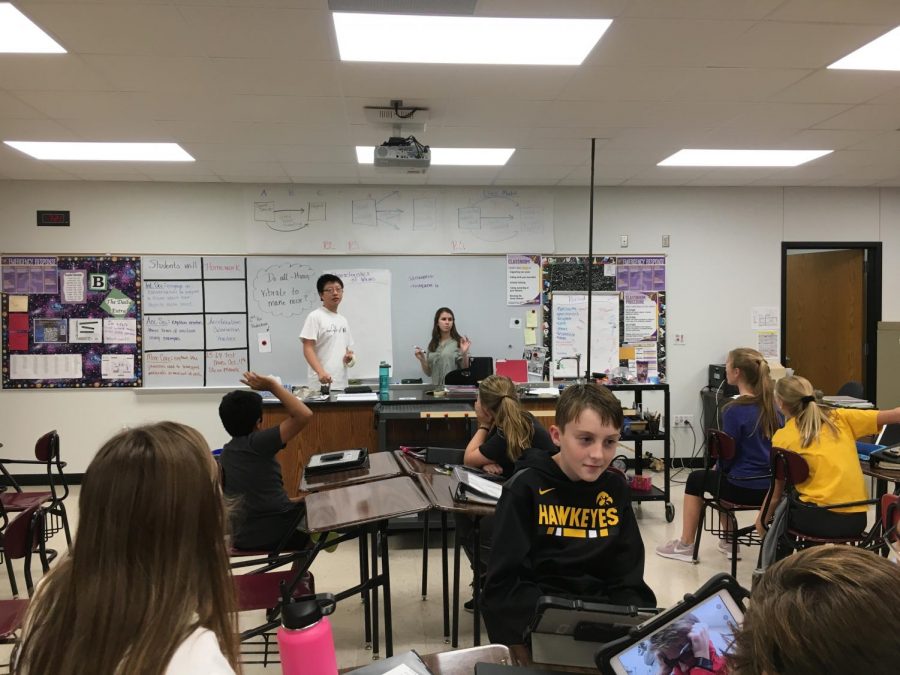 Matthew Ding 20 and Rachel Winkler 21 coach middle school Mock Trial students at their weekly practice. Ding and Winkler had to go through a selective application process due to the Silver Cord changes.