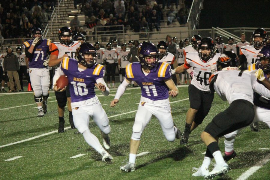 no. 10 Andrew Nord 19  rushes the ball.. During that game nord had a personal passing record of 211 yards