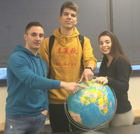 The three foreign exchange students at Johnston: Eduard Stancu from Italy, Aleksa Dogandzic from Serbia, and Anastasia Bilak from Ukraine.