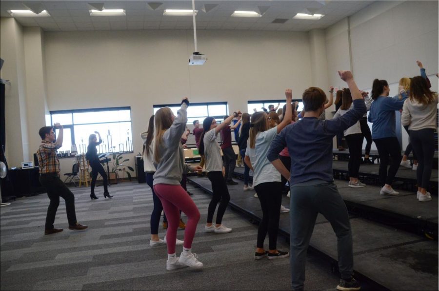 Trevor Wiley teaches students line dancing. Students had the opportunity to sign up in the last round of Dragon Time.