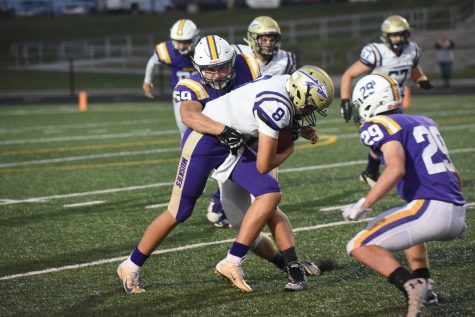 Johnston shuts Muscatine out 14-0