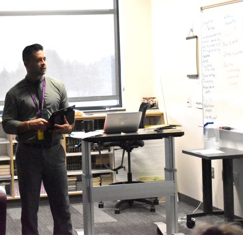 Erik Dominguez presenting about how everyone's differences make them unique and important to society.