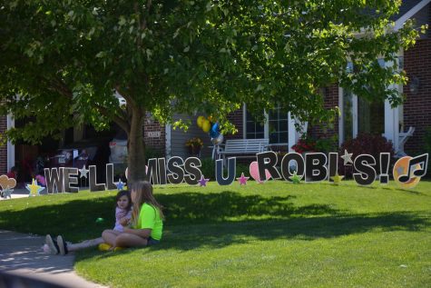 Neighborhood kids watching as the cars pass for the send off to Jeff and Samantha Robilliard.