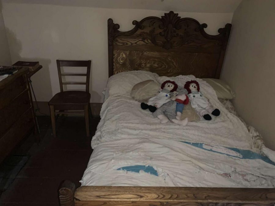 This is the parents bed and chair upstairs in the Ax Murder House. The parents were killed in this bed. The Ax Murder House is located in Villisca, Iowa.