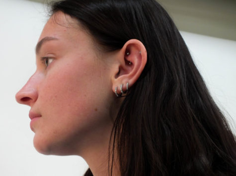 Brooklyn Haller 23 turned to the side to show off her lobe, daith, and cartilage piercings.