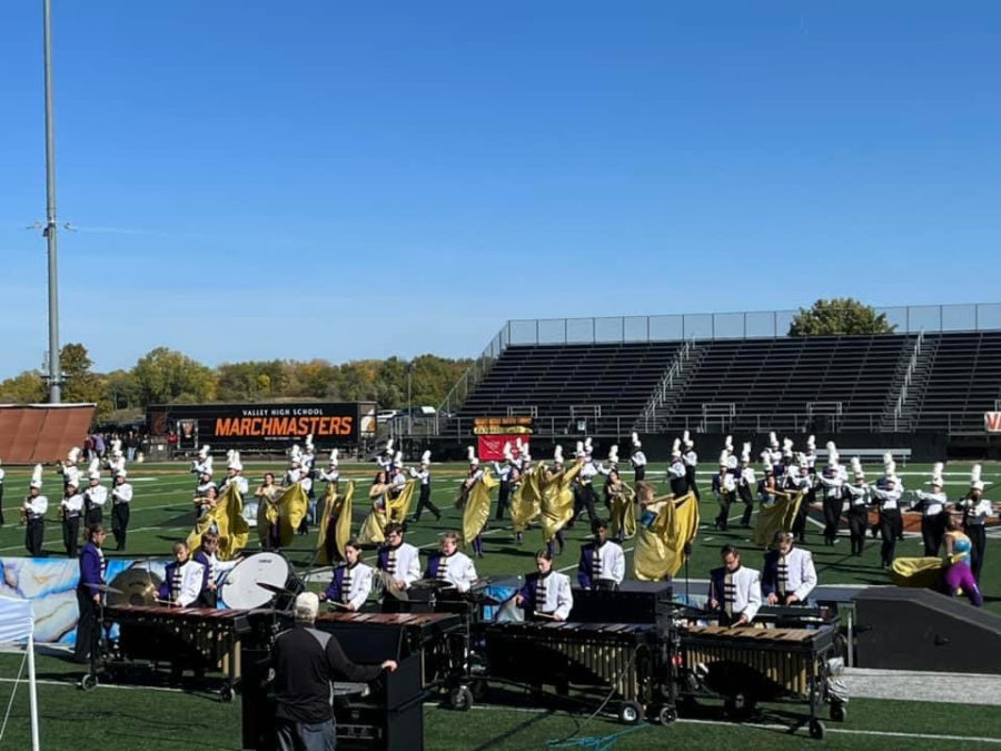 The+band+marches+on+a+clear+morning+at+Valley+High+Schools+stadium.+