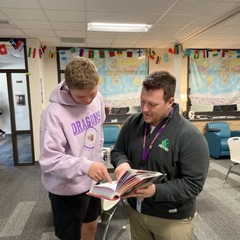 Mr. Griffin helping student during class.