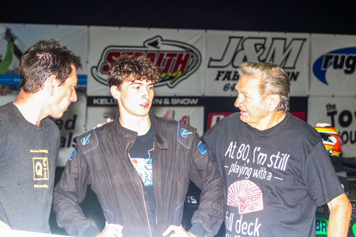 Carr is joined by his dad John Carr and his grandfather Gary Carr during driver introduction prior to the IMCA Mod Lite feature event on N 3rd Ave Dairy Larry Wollam Season Championship night at Marshalltown Speedway.