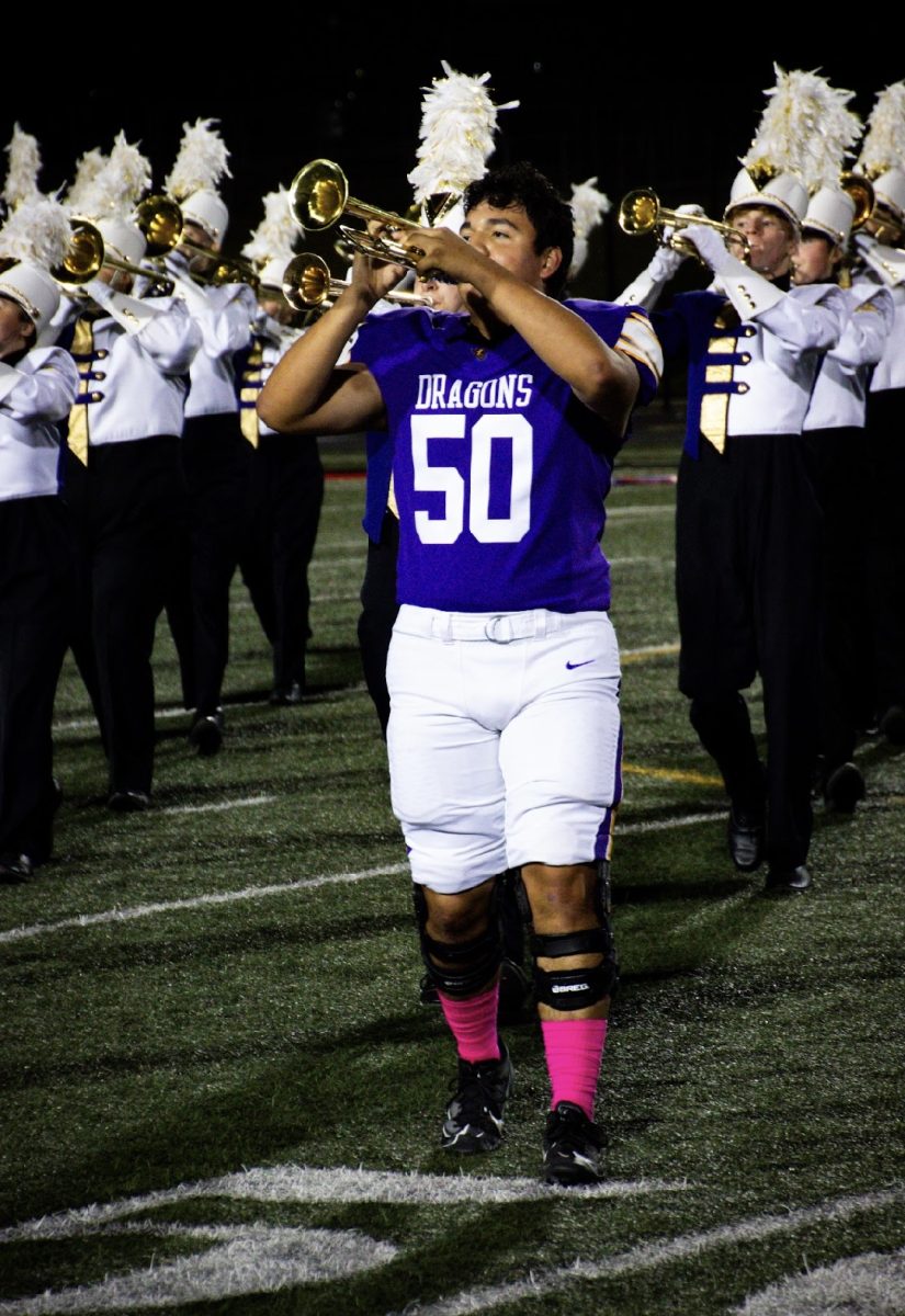 Jahir Guitierrez plays his trumpet at half time show on October 11th