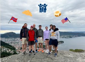 The Skram family standing on a cliff together posing for a photo in Norway on June 14.
